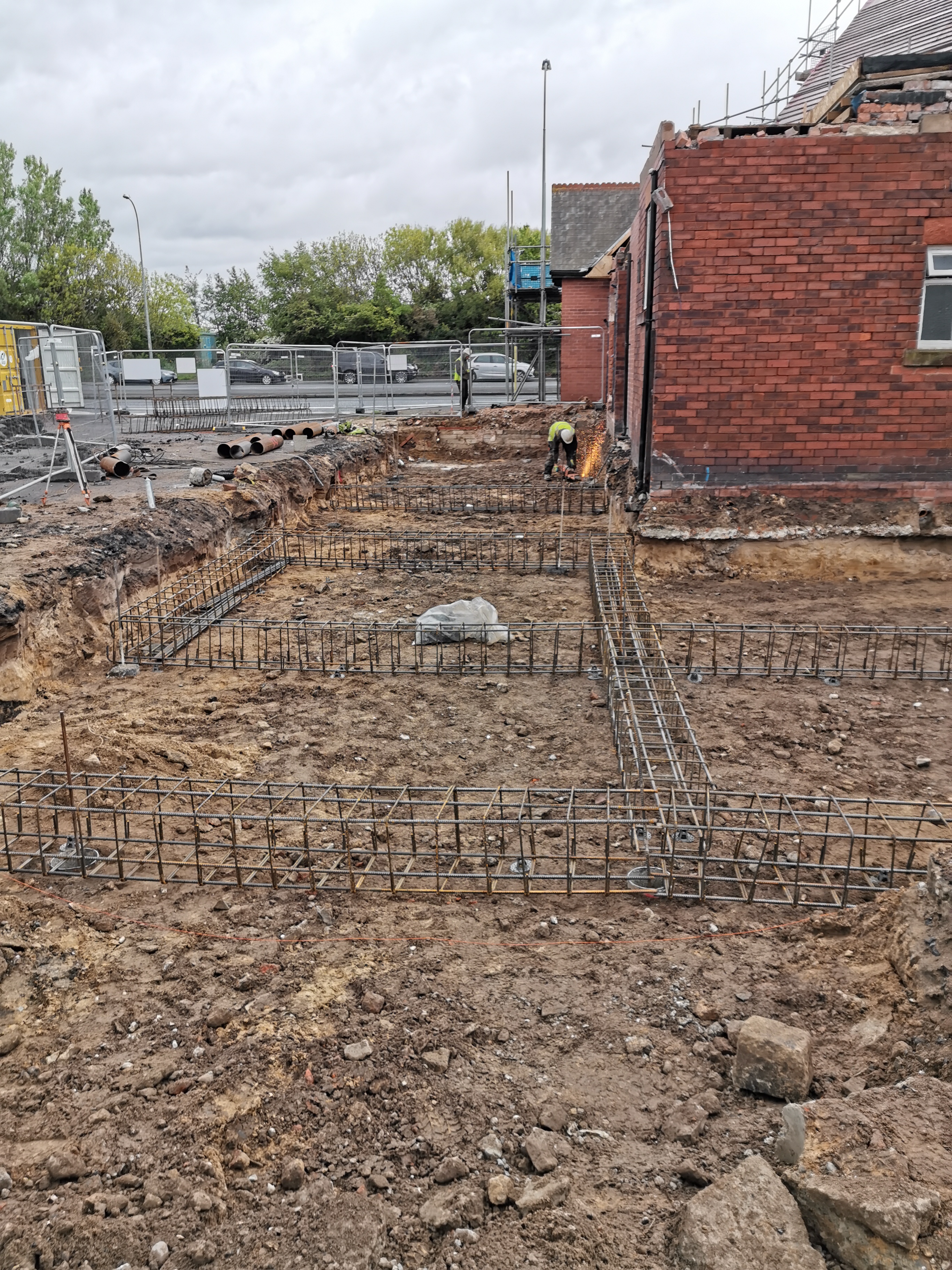 Additional reinforced concrete beam works