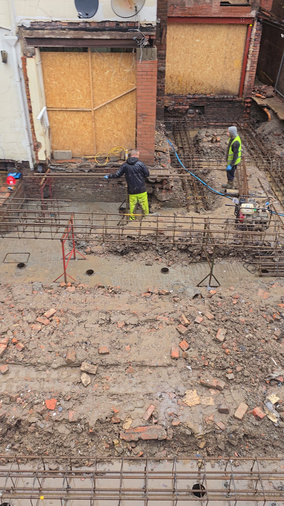 Structural groundwork sequencing around existing pub